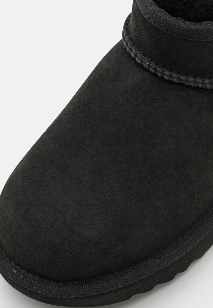 CLASSIC ULTRA MINI UNISEX - Classic ankle boots - black UGG CLASSIC ULTRA MINI UNISEX - Classic Ankle Boots - Black -UGG Shop 18a98ca19d8148e9af5bd6dff32c018b