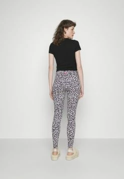 UGG SAYLOR - Leggings - Trousers - Black/lilac -UGG Shop 8ab48c58748d46d1a7b5ed37d917df3f