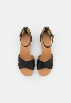 UGG EUGENIA - Wedge Sandals - Black -UGG Shop 8f4e30877eb74db082f637eec0c2ed92