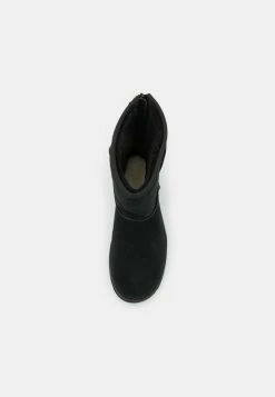UGG CLASSIC SHORT LOGO ZIP - Classic Ankle Boots - Black -UGG Shop 9a85d35f50d74ad6bf08566280cd399d