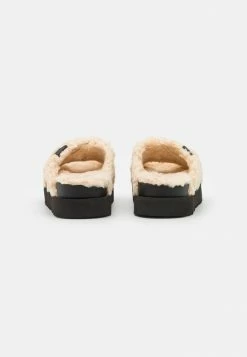 UGG FUZZ SUGAR CROSS SLIDE - Mules - Natural/black 3 UGG FUZZ SUGAR CROSS SLIDE - Mules - Natural/black -UGG Shop 9e1de8ccce844bb7ba3f9ba6c3e96b10