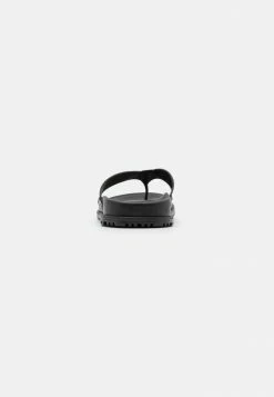 UGG WAINSCOTT FLIP - T-bar Sandals - Black 8 UGG WAINSCOTT FLIP - T-bar Sandals - Black -UGG Shop b631d77f35664c1c8aab9d3e902cf5c9