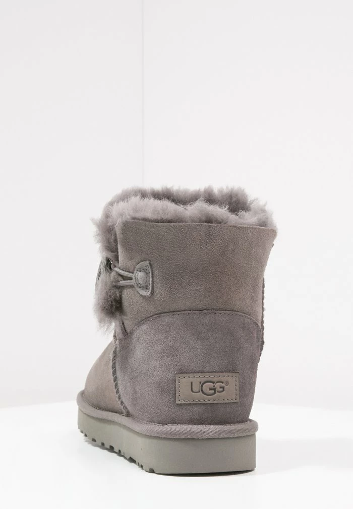 MINI BAILEY BUTTON - Ankle boots - grey UGG MINI BAILEY BUTTON - Ankle Boots - Grey -UGG Shop b8e06829630c4bc4b5c8298b93e83cf1
