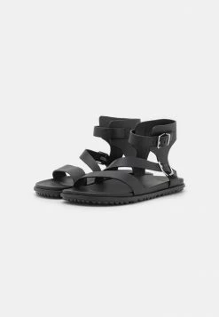 UGG SOLIVAN STRAP - Sandals - Black -UGG Shop f6bb985ea87540d0bd394ef9c29f0755